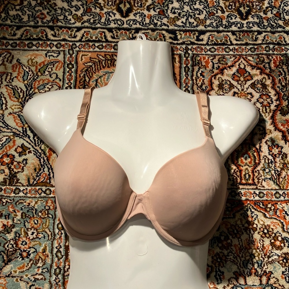Beige 32DD Victoria’s Secret molded cup underwire bra.
